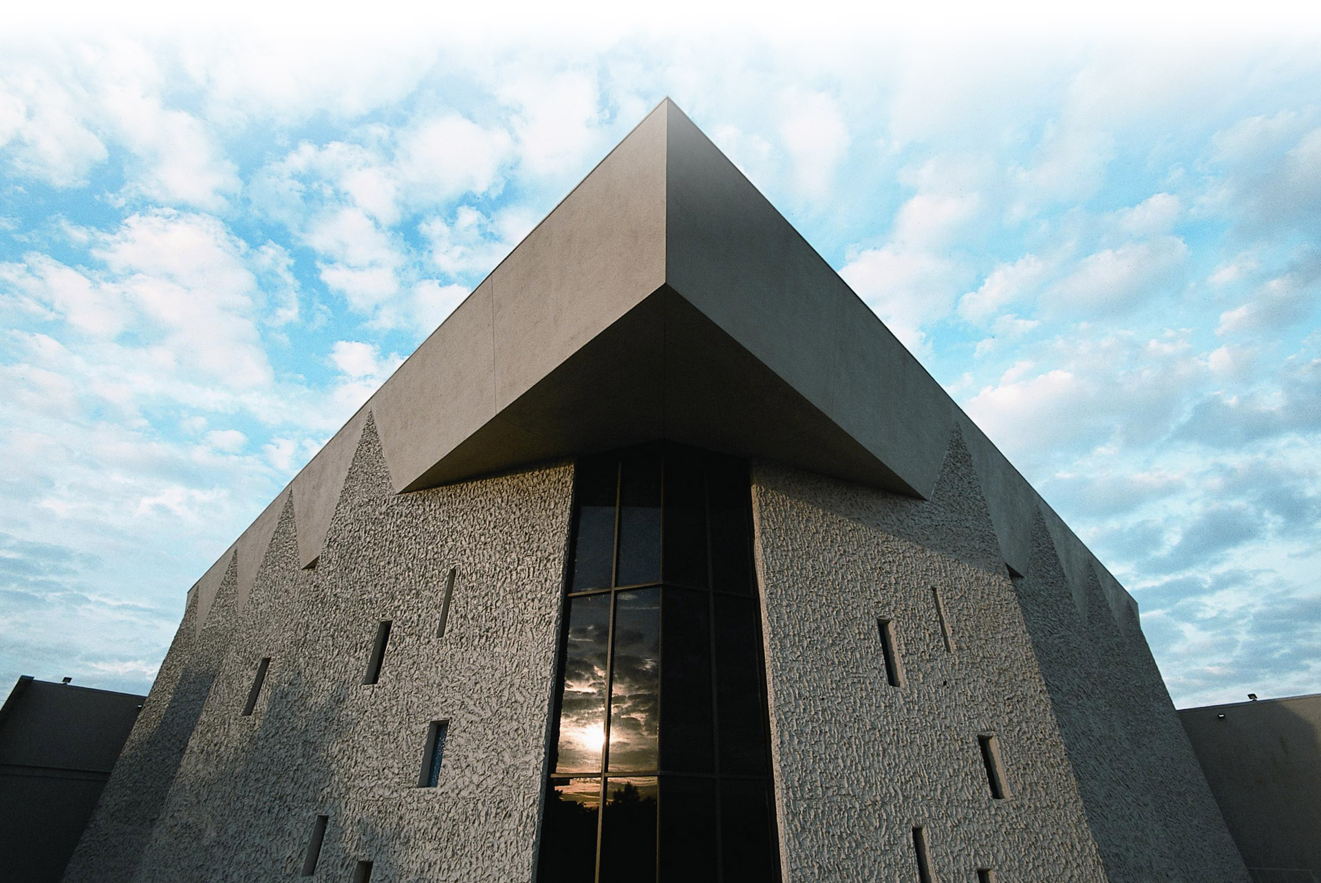 Bininger Theatre at Eckerd College is a tall building with modern architecture