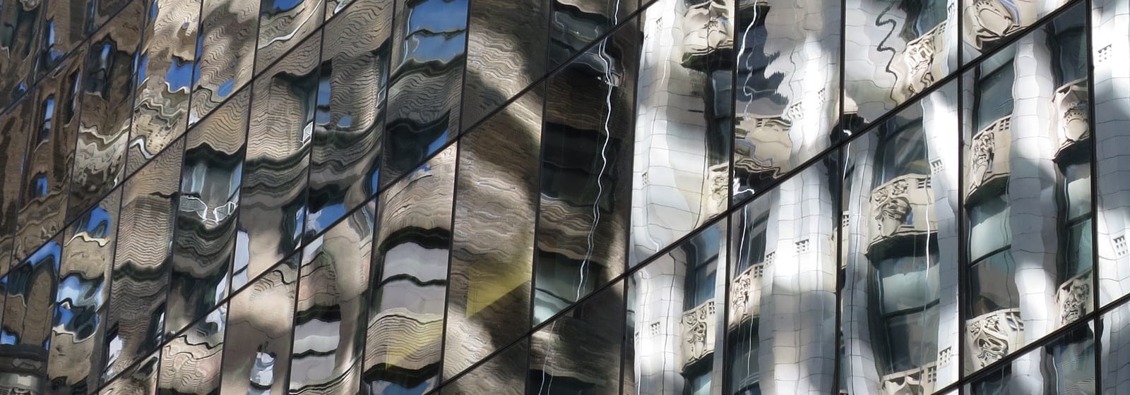 Reflections in windows of skyscrapers