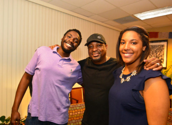 Chuck D. of the band Public Enemy, emcee, author, and producer with two students