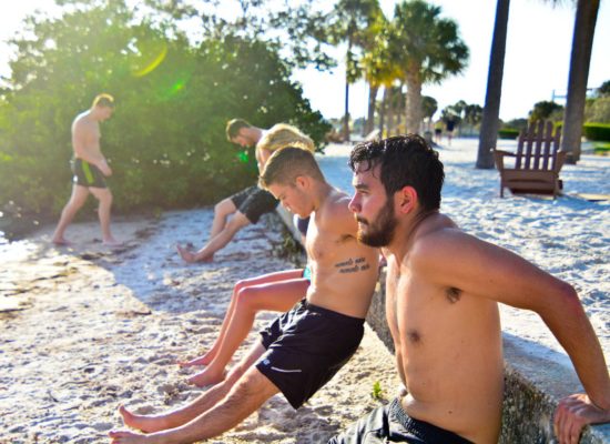 Students exercising for Xfit club on South Beach