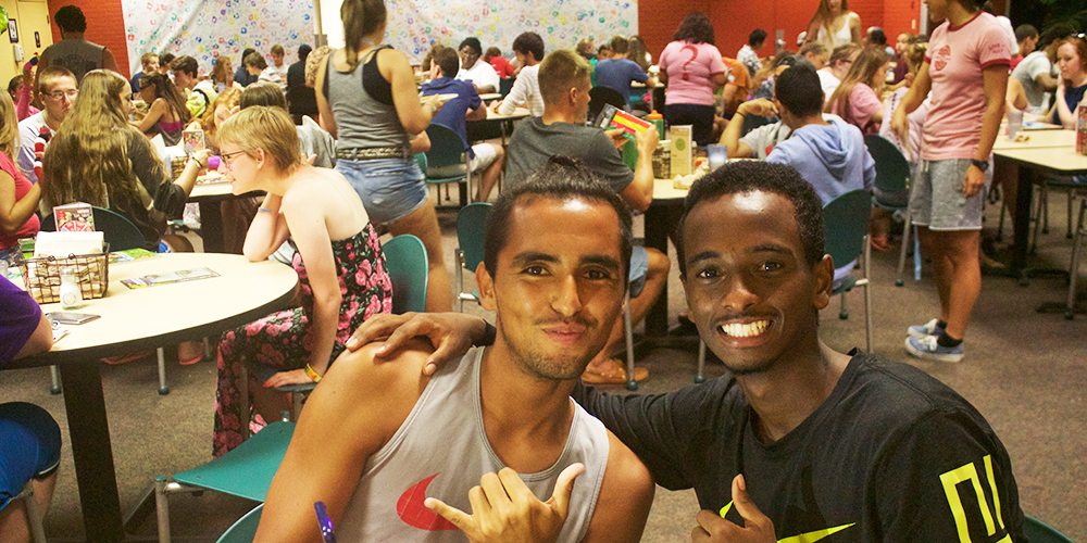 Two male students at late night breakfast