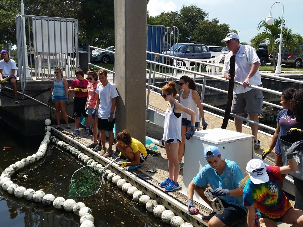 Students cleaning waterway with Tampa Bay Estuary Program