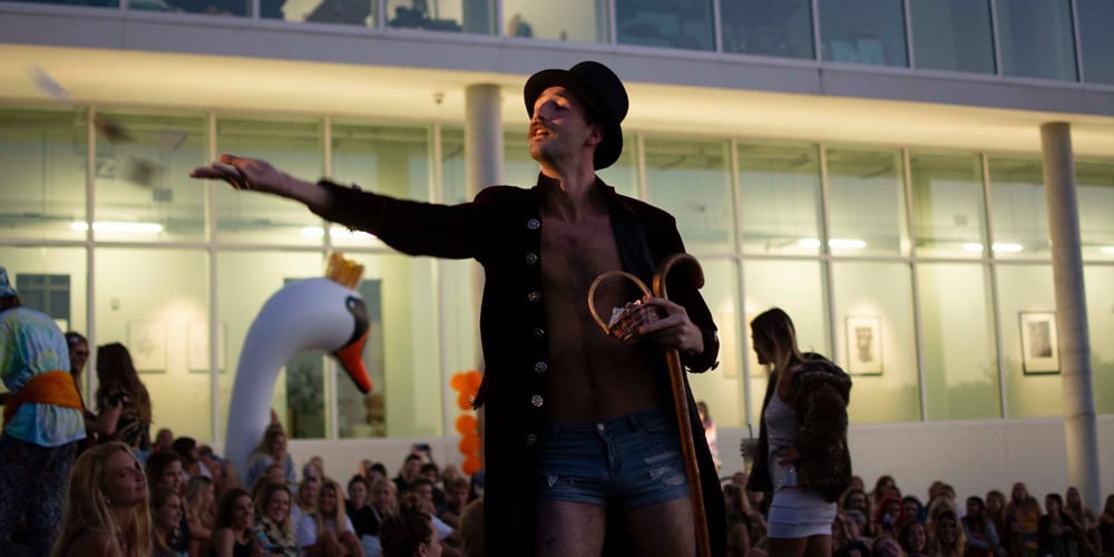 Student on stage in front of crowd