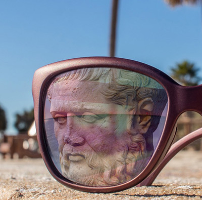 Sunglasses with image of Plato in reflection