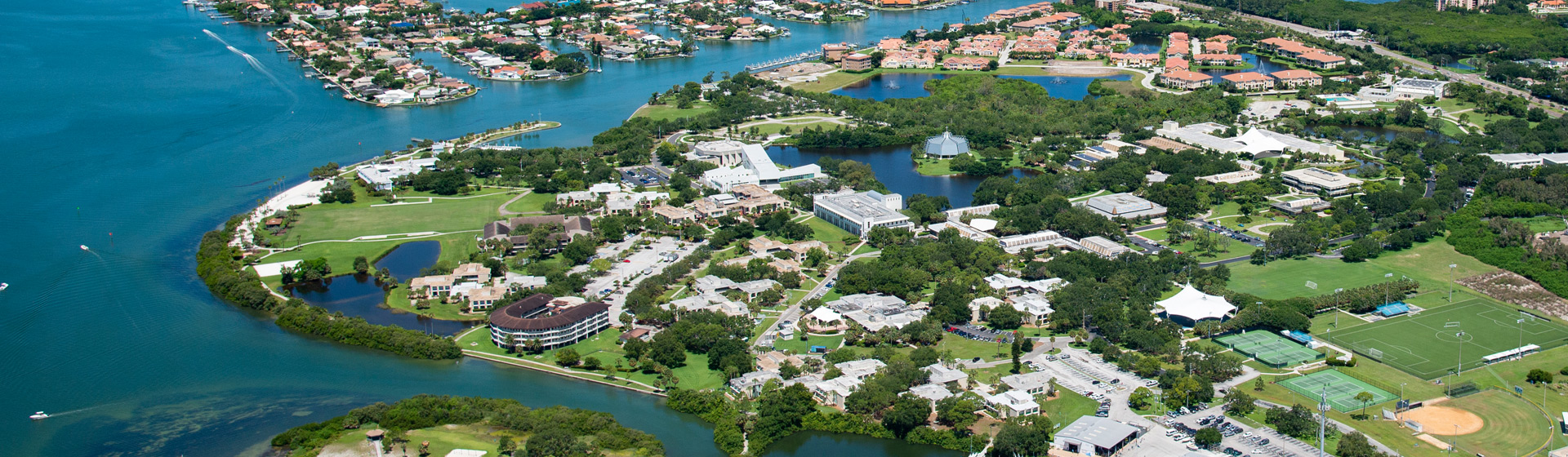 Aerial view of the Eckerd College campus surrounded by water