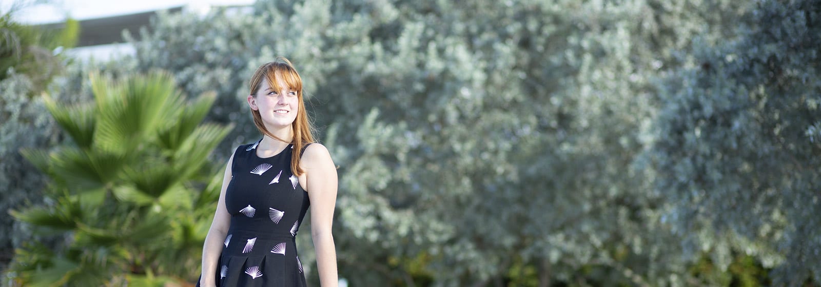Eckerd College student intern in formal attire