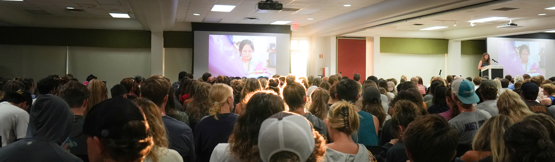 Crowd of Eckerd students seated in a hall for a public lecture